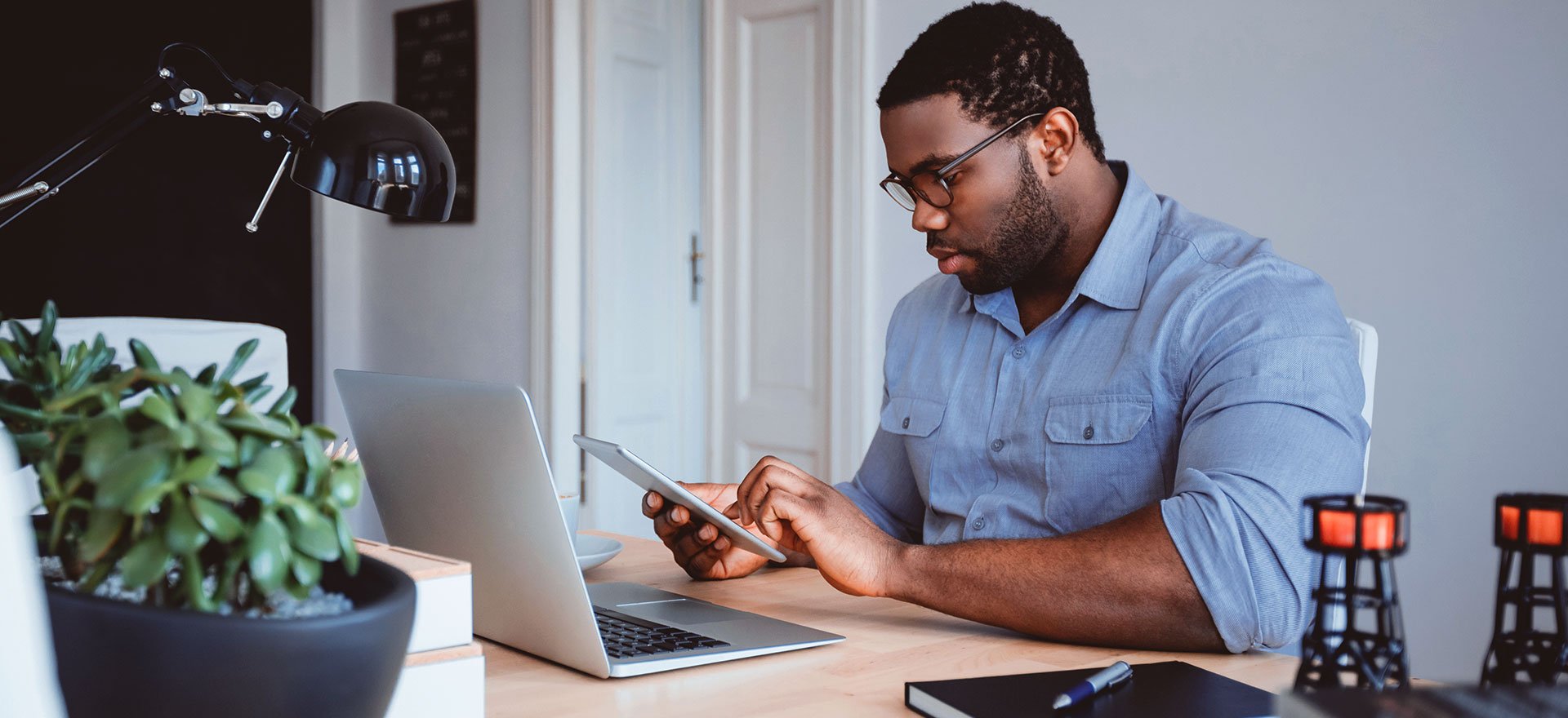 A man at a computer looking at online business loans